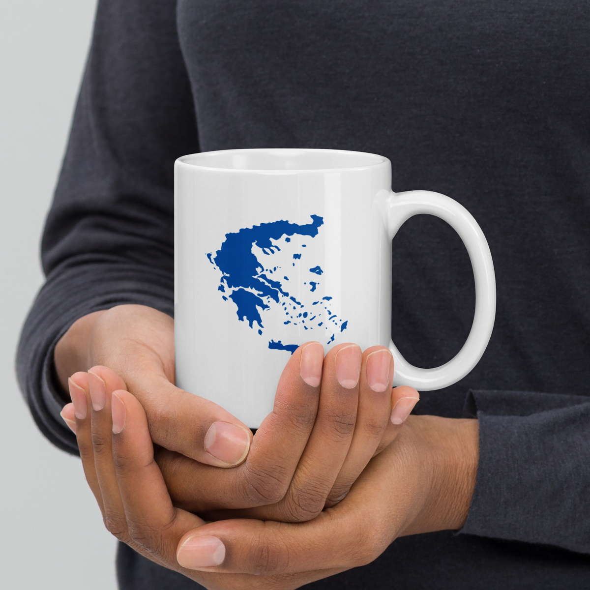 White glossy mug featuring a blue and white map of Greece — additional product photo.