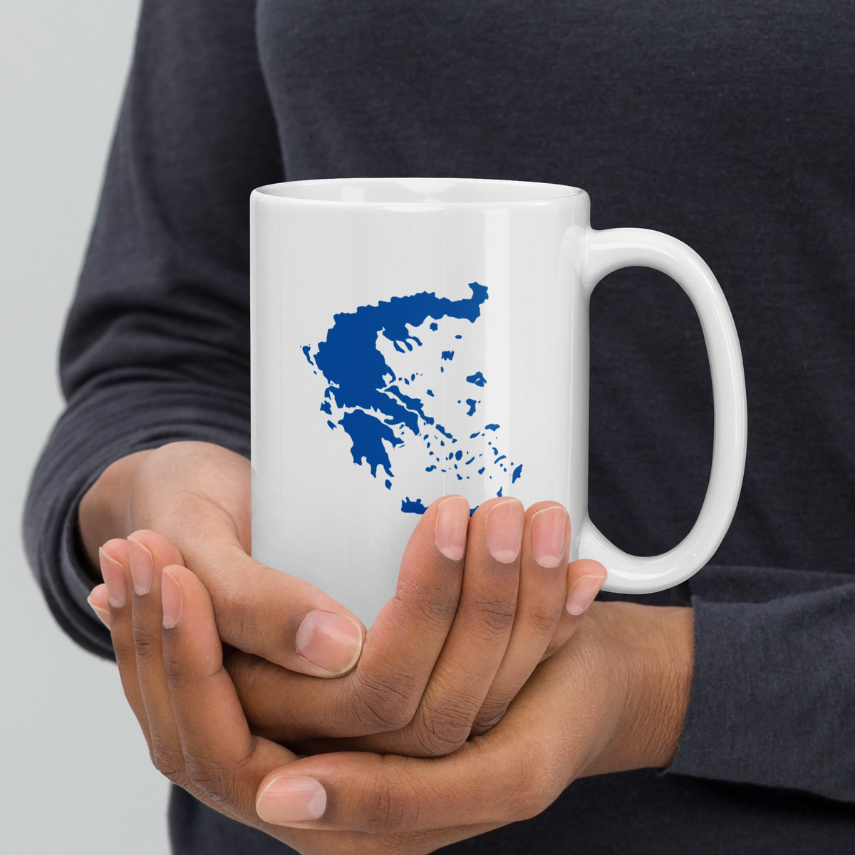 White glossy mug featuring a blue and white map of Greece — additional product photo.